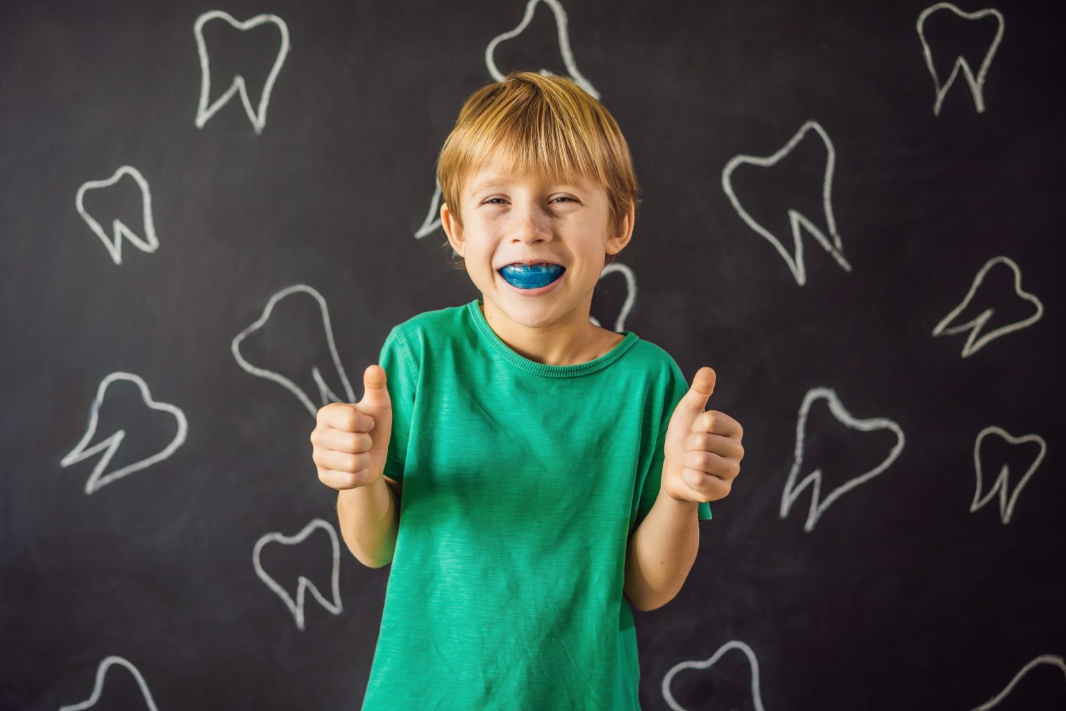 Six Year Old Boy Shows Myofunctional Trainer. Helps Equalize The Growing Teeth And Correct Bite, Develop Mouth Breathing Habit. Corrects The Position Of The Tongue
